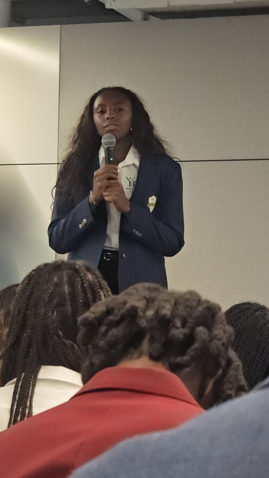 Laila speaking at a youth leadership event